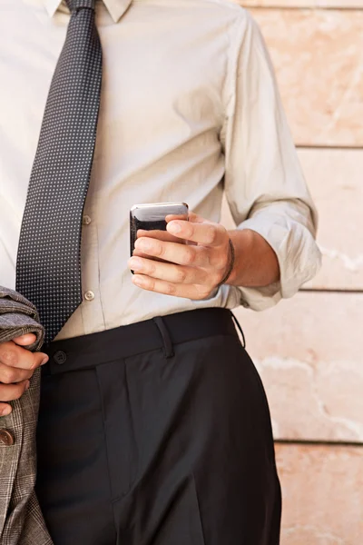 Businessman using a smart phone — Stock Photo, Image