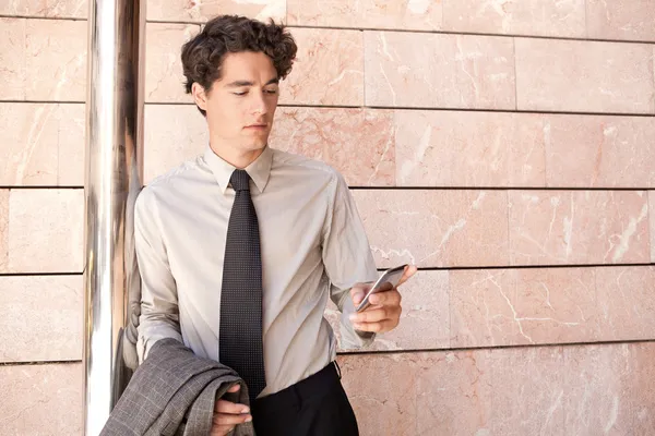 Businessman using a smart phone — Stock Photo, Image