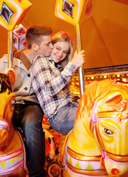 Couple kissing and riding — Stock Photo, Image