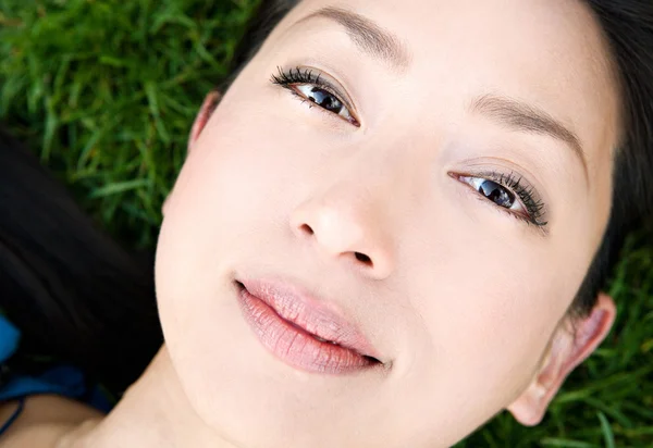 Japanese woman laying — Stock Photo, Image