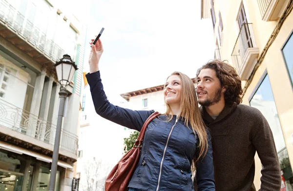 Couple taking pictures — Stock Photo, Image