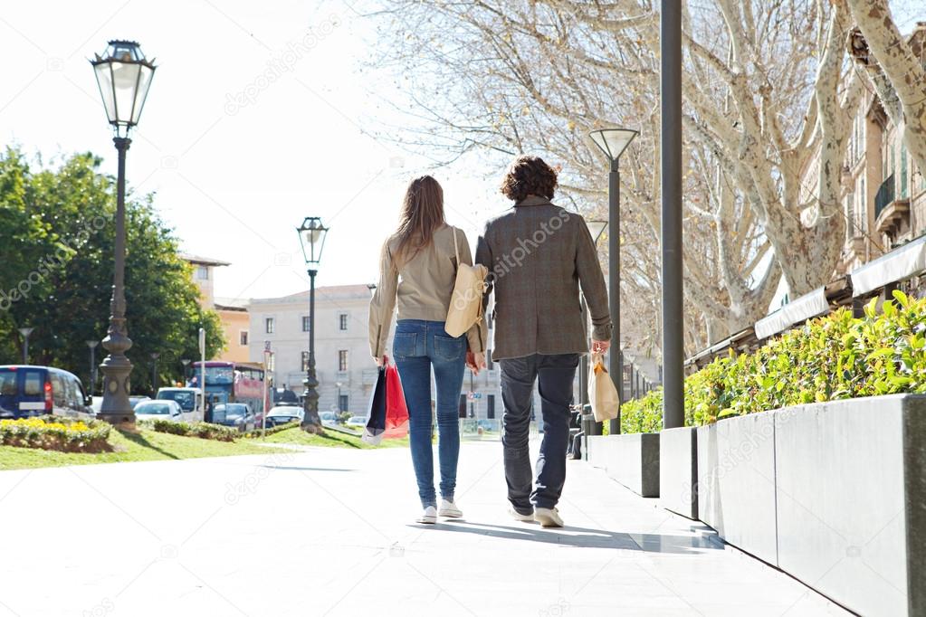 Couple holding walking together