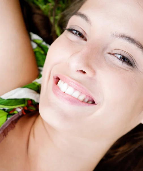 Woman relaxing while laying — Stock Photo, Image