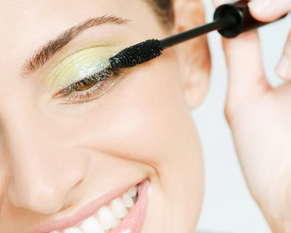 Woman wearing green eyeshadow — Stock Photo, Image