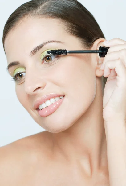 Woman wearing green eyeshadow — Stock Photo, Image