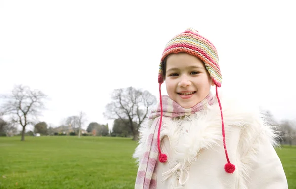 Girl wearing a coat — Stock Photo, Image