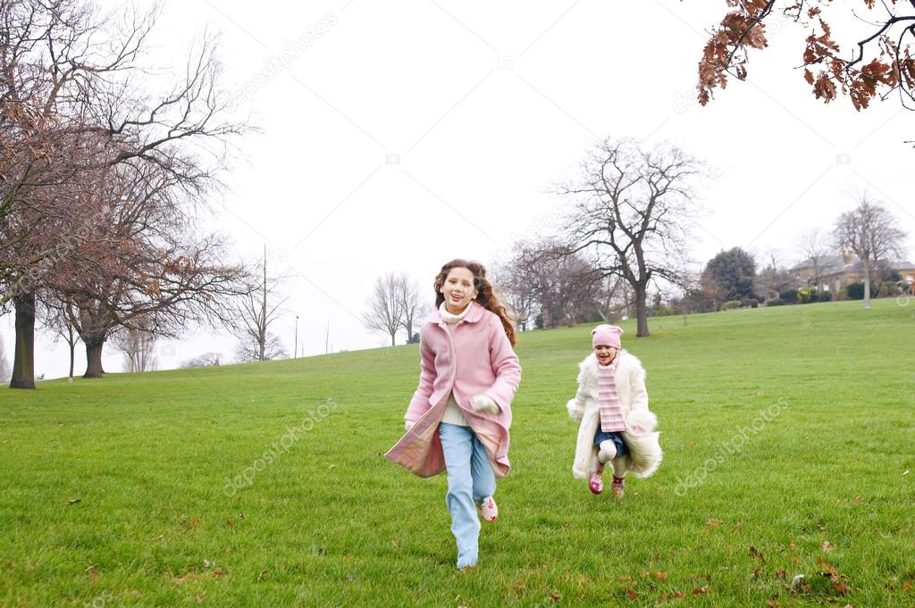 Young  sisters  in a park