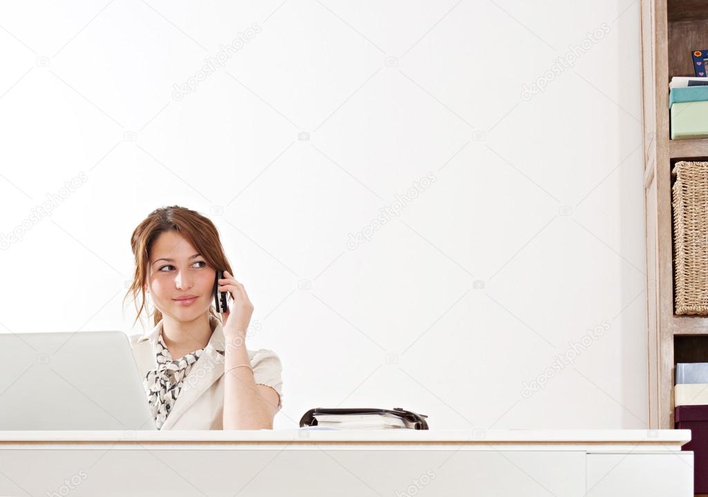 Businesswoman sitting in office