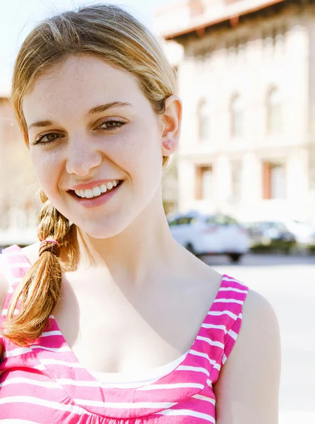 Girl standing near college — Stock Photo, Image