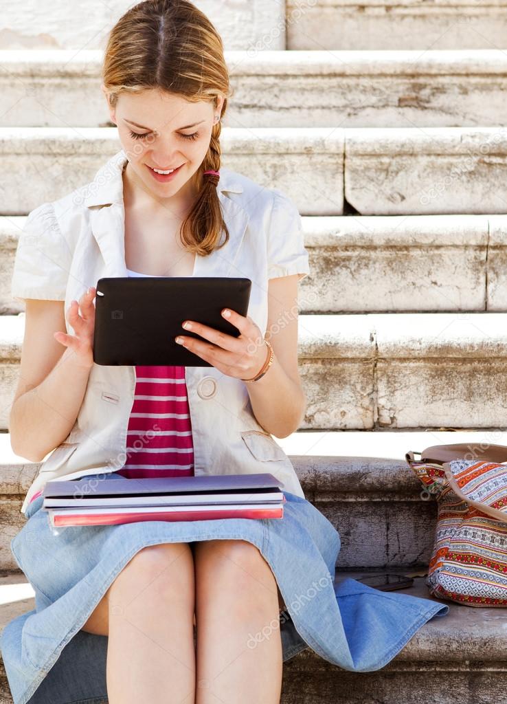 Girl using  digital tablet