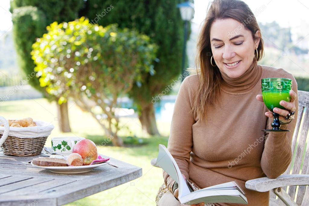 Woman relaxing and reading