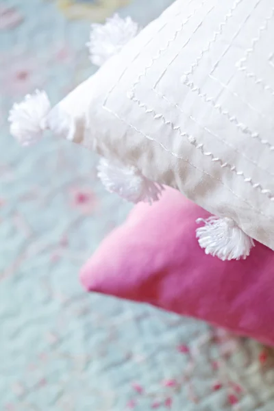 Embroidered white cushion — Stock Photo, Image