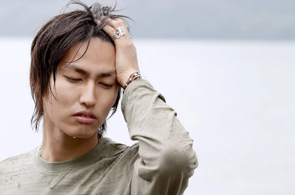 Depressed asian japanese young man — Stock Photo, Image