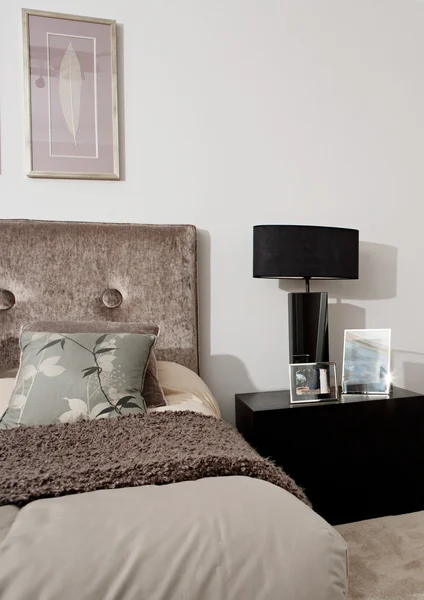 Hotel bedroom decorated in dark brown colors — Stock Photo, Image