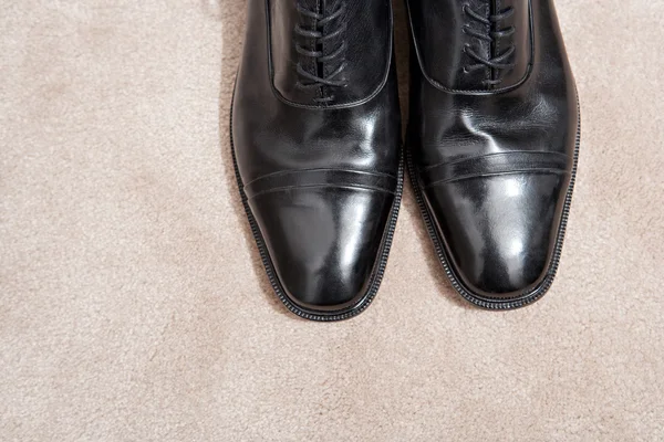 Pair of black leather businessman shoes — Stock Photo, Image