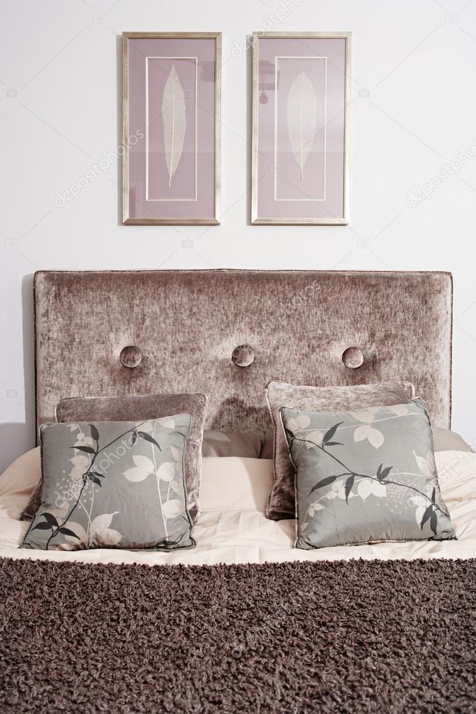 Bed head in an elegant hotel double bedroom