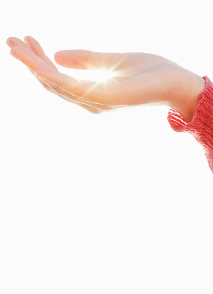Ženská ruka drží slunce — Stock fotografie