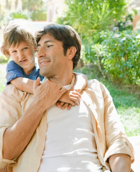 Son hugging his father — Stock Photo, Image