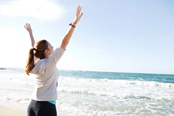 Woman stretching her arms — Stock Photo, Image