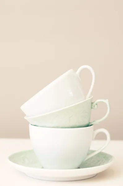 Pile of three tea cups and handles — Stock Photo, Image