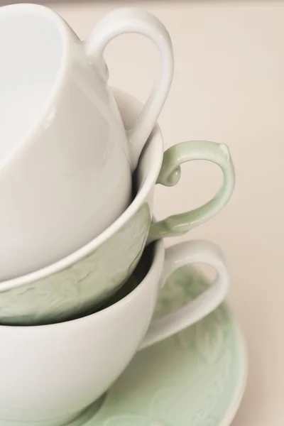 Pile of three tea cups and handles — Stock Photo, Image