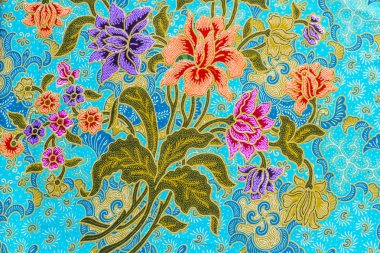 batik arka plan üzerinde güzel renkli çiçekler