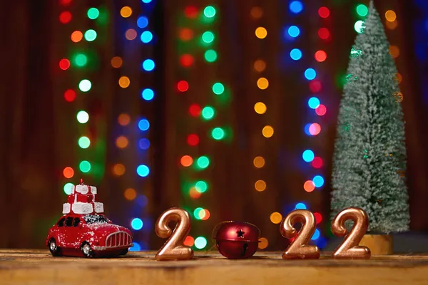 Feiertag Hintergrund Zahlen Des Jahres 2022 Durch Goldkerzen Auf Bokeh — Stockfoto