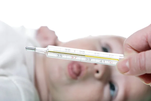 Termometrul și nou-născutul cu limba afară — Fotografie, imagine de stoc