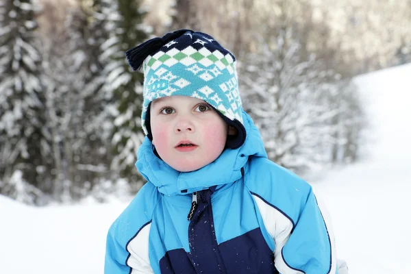 Boy in winter on mountains — Stock Photo, Image
