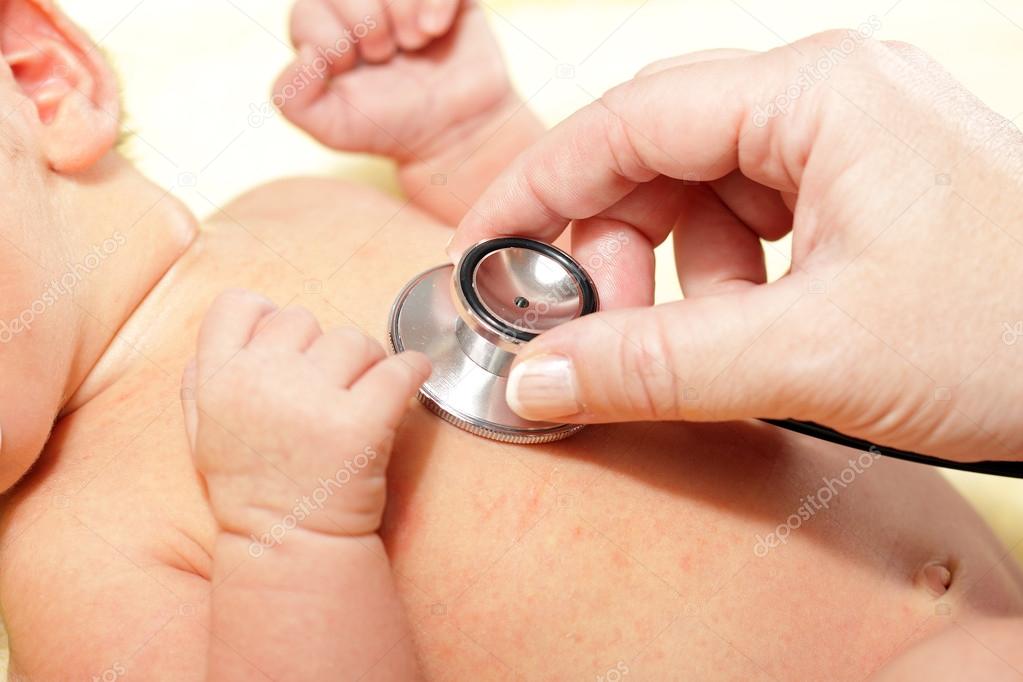 Stethoscope listening to a baby