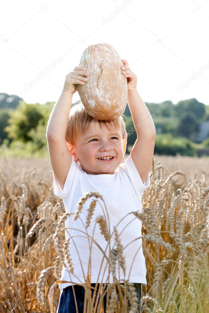 Little boy with the bread