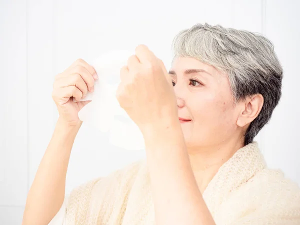 Portrait Mature Asian Woman 50S Face Mask Skin Care Treatment — Fotografia de Stock