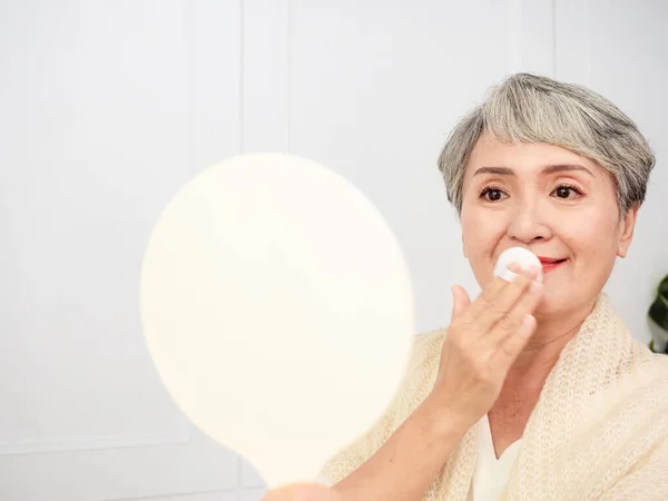 Portrait Mature Aged Asian Woman 50S Touching Face Skin Looking — Fotografia de Stock