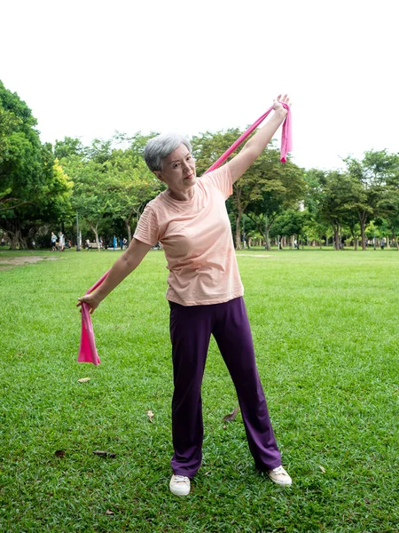 Portrait Mature Asian Woman 60S Wearing Sports Clothing Exercising Elastic — Stock Photo, Image