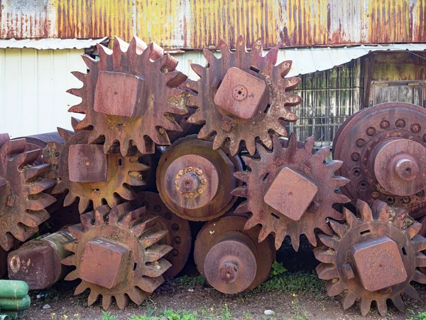 the old and rusty diesel engine gears are abandoned