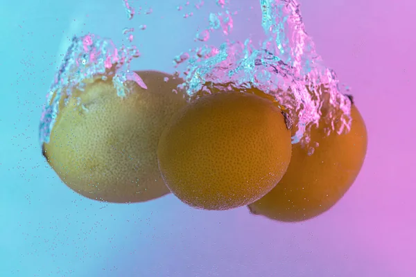 Lemons Fall Water Background Gradient Pink Blue Light — Fotografia de Stock