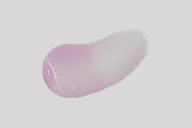 Açık arkaplandaki kozmetik lekeli mor renk. Yukarıdan görüntüle.