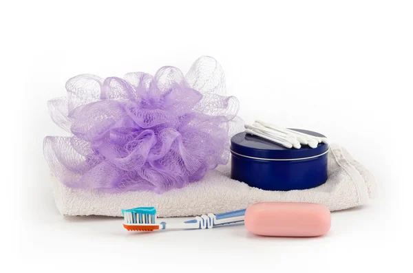 Washcloth, soap, toothbrush and cream — Stock Photo, Image