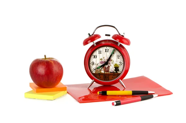 Papelería y manzana sobre fondo blanco — Foto de Stock