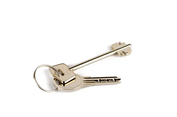 Två nycklar är anslutna med en ring — Stockfoto