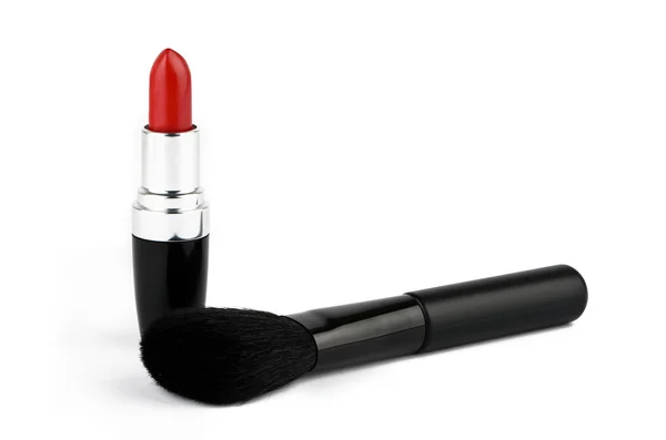Red lipstick and fluffy powder brush — Stock Photo, Image