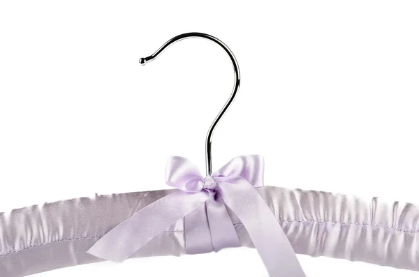 Hanger with a purple bow — Stock Photo, Image