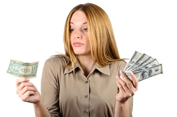 Beautiful woman looking at a dollar — Stock Photo, Image