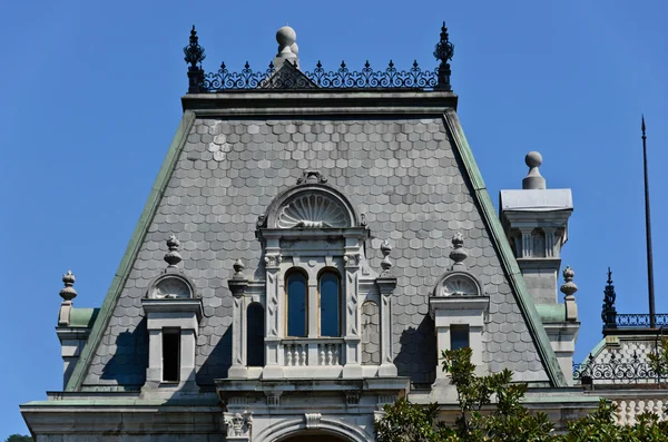 The window on the trapezoidal roof close-up — Stock Photo, Image