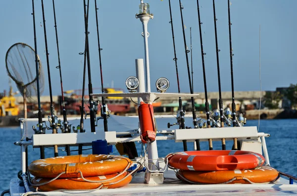 Barco com varas de pesca — Fotografia de Stock