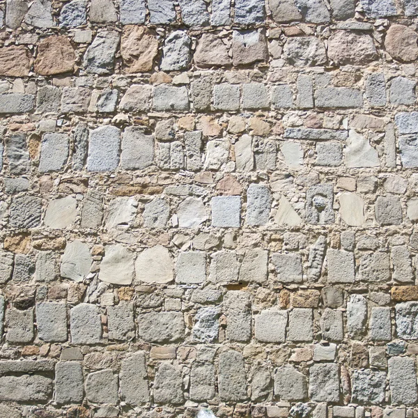 Texture d'un mur de pierre marron. — Photo