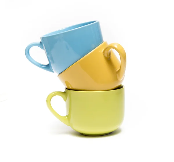 Colorful cups on white background. — Stock Photo, Image