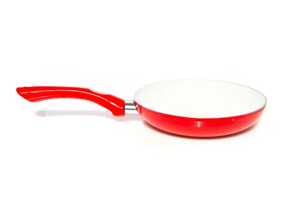 Красный и белый сковороды на изолированном фоне — стоковое фото