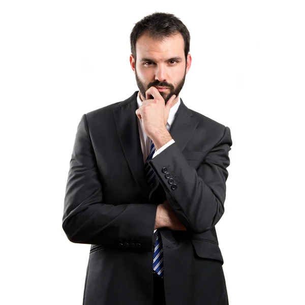 Business man thinking over white background — Stock Photo, Image