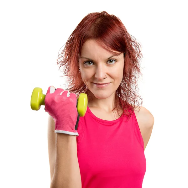 Chica joven haciendo levantamiento de pesas sobre fondo blanco — Foto de Stock